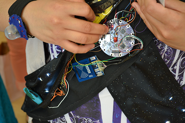 final working prototype of garment with electronics worn by teammate